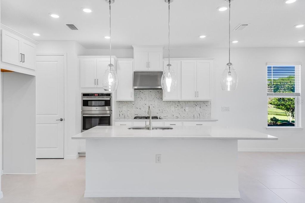 Photo of 581 Moon Shell Circle, New Smyrna Beach, FL 32168 (MLS # O6345902)