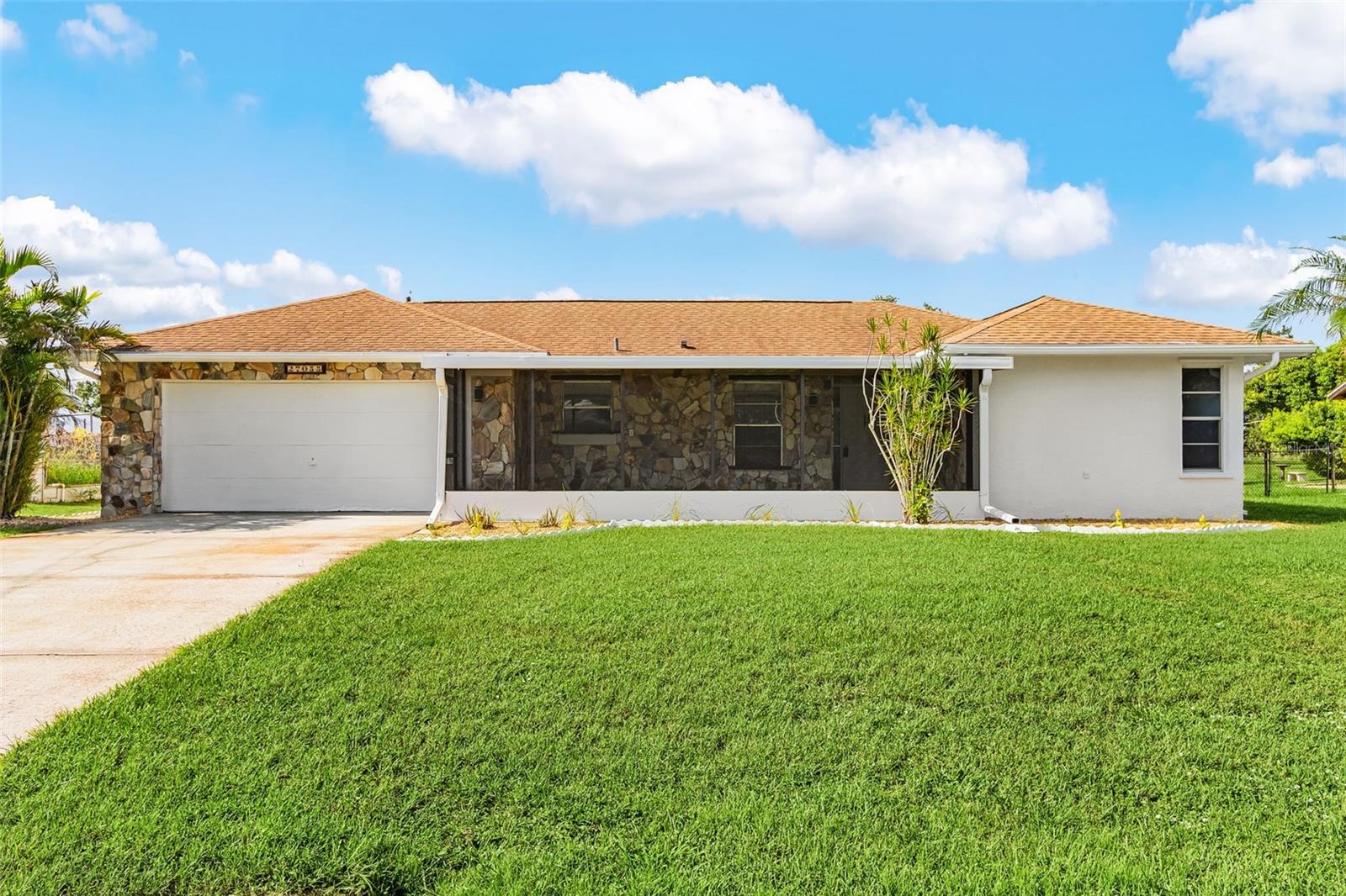 Welcome to your new home! This stunning property features 3 bedroom, 2 bathroom home plus a large den that could easily be a 4th bedroom. Located in a very quiet & friendly neighborhood in Punta Gorda, this property features fresh interior & exterior paint, upgraded flooring in the main areas and newer carpet for the bedrooms. Home also has upgraded kitchen with solid butcher block counter tops with a large covered screened in front porch, along with screened rear covered patio. Additional features include hurricane shutters, newer appliances, double car garage, oversized driveway, very large partially fenced yard and a recently updated roof. Great location, easy access to I-75, restaurants, shopping & schools. Nearby Harbour Heights Park features a community boat ramp, basketball & tennis courts and community dock & picnic area. Downtown historic Punta Gorda is just a short drive and offers arts, community events & entertainment. Call for your private showing today!