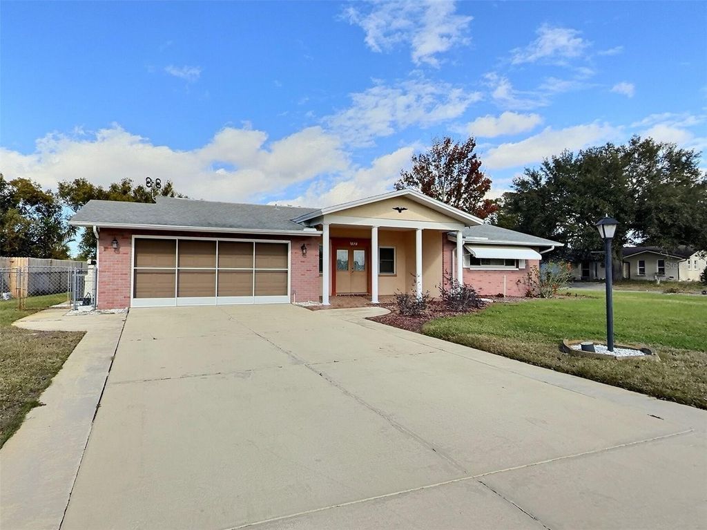 Photo of 7707 Briarwood Drive, Port Richey, FL 34668 (MLS # OM716793)