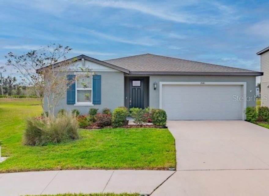 Welcome to the stunning Hibiscus model by Meritage Homes, a true gem in the heart of Salt Meadows, Parrish, Florida. This practically brand new home embodies modern living while seamlessly integrating comfort and style. The Hibiscus model boasts a thoughtfully designed floor plan that maximizes both space and functionality. With a generous open-concept layout, this home features a spacious great room that flows effortlessly into a gourmet kitchen, perfect for entertaining family and friends. The kitchen is equipped with top-of-the-line appliances, ample counter space, and a large island, making meal prep a delight. The luxurious owner’s suite, complete with a spa-like ensuite bathroom and expansive walk-in closet, serves as a private retreat. Additional bedrooms are equally spacious, ensuring comfort for all family members. The Hibiscus’s design emphasizes natural light, with large windows and sliding glass doors leading to a large pie shaped backyard with no rear neighbors and a pond view! ideal for enjoying Florida’s beautiful weather. Spray foam insulation throughout, plus better quality windows, paints and wood look tile flooring.  Salt Meadows is not just a community; it’s a lifestyle. Nestled amidst picturesque landscapes and tranquil surroundings, this community offers a resort-style atmosphere with amenities such as a sparkling swimming pool, Fitness Center, Walking Trails, Basketball, Pickelball and Playgrounds. Families will appreciate the proximity to top-rated schools, while nature enthusiasts can explore nearby parks and recreational areas. Parrish, Florida, is a charming town that perfectly blends rural tranquility with modern conveniences. Located just a short drive from the vibrant cities of Tampa and Sarasota, residents enjoy easy access to shopping, dining, and cultural experiences. The area is also known for its outdoor activities, including boating, fishing, and hiking, making it an ideal place for those who love an active lifestyle. What truly sets Meritage Homes apart from other builders is their unwavering commitment to energy efficiency and sustainability. Each home is built with innovative energy-saving features that not only reduce your carbon footprint but also lower utility costs. Meritage Homes prioritizes quality craftsmanship, ensuring that every home is built to the highest standards, providing peace of mind for homeowners. Discover the serenity of Parrish, the beauty of Salt Meadows, and the unparalleled quality of the Hibiscus model by Meritage Homes. This is more than just a house; it’s a place to call home. Don’t miss your chance to experience a lifestyle defined by comfort, convenience, and community. Schedule a showing today and see for yourself what makes this home, Lot, community and Location truly special!