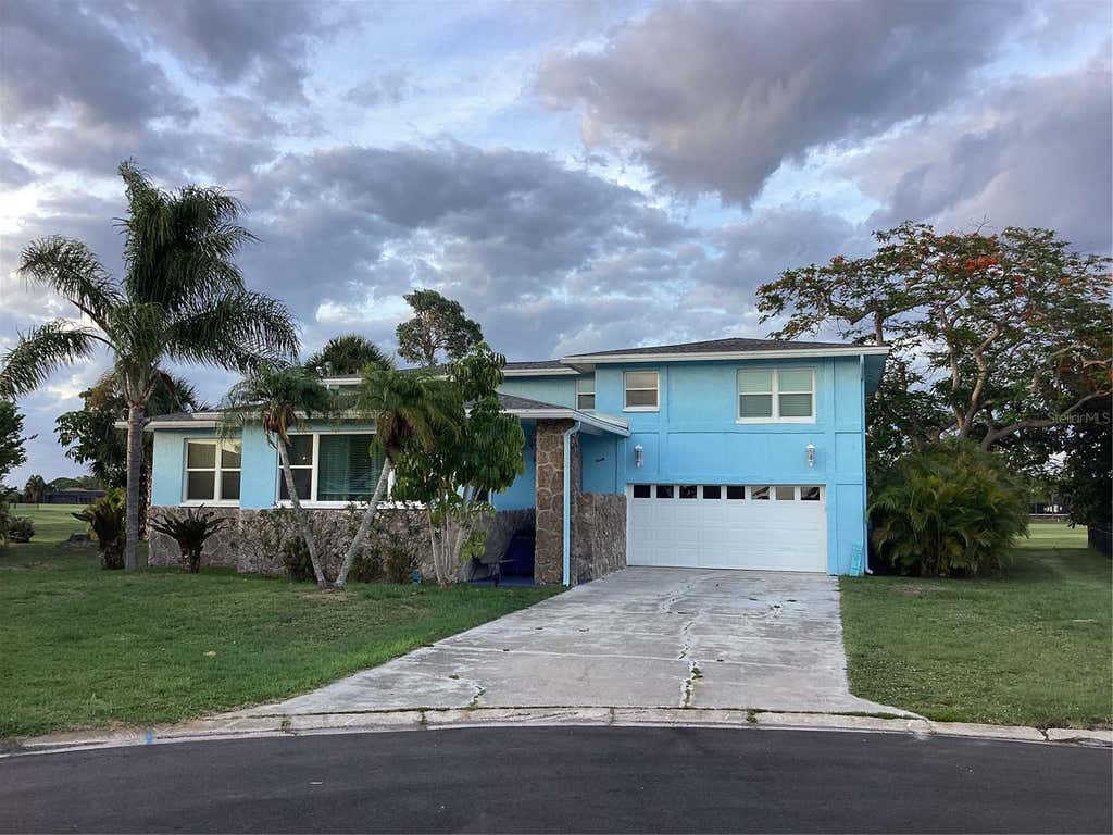 Photo of 90 Oakland Hills Court, Rotonda West, FL 33947 (MLS # TB8518218)