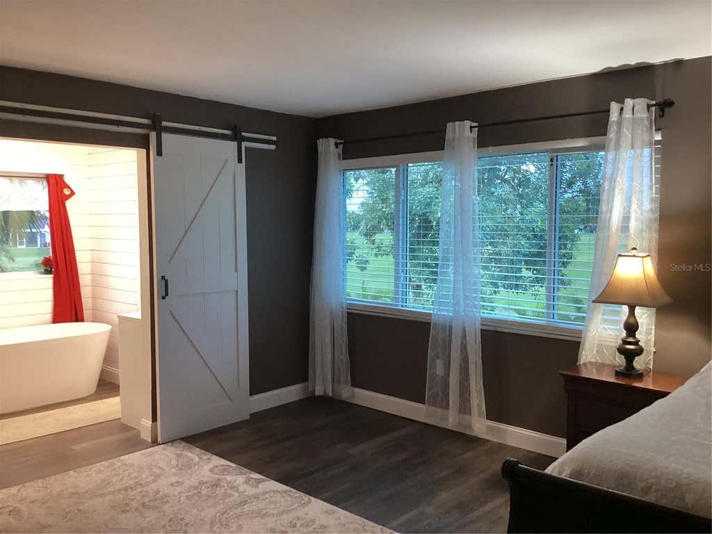 Photo of 90 Oakland Hills Court, Rotonda West, FL 33947 (MLS # TB8518218)