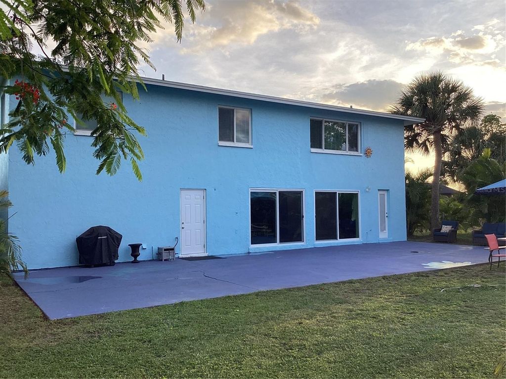 Photo of 90 Oakland Hills Court, Rotonda West, FL 33947 (MLS # TB8518218)