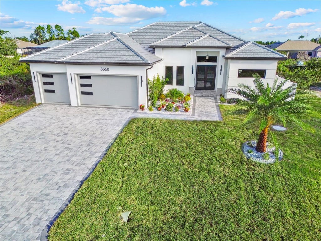 Photo of 8568 Santa Cruz Drive, Port Charlotte, FL 33981 (MLS # C7532408)