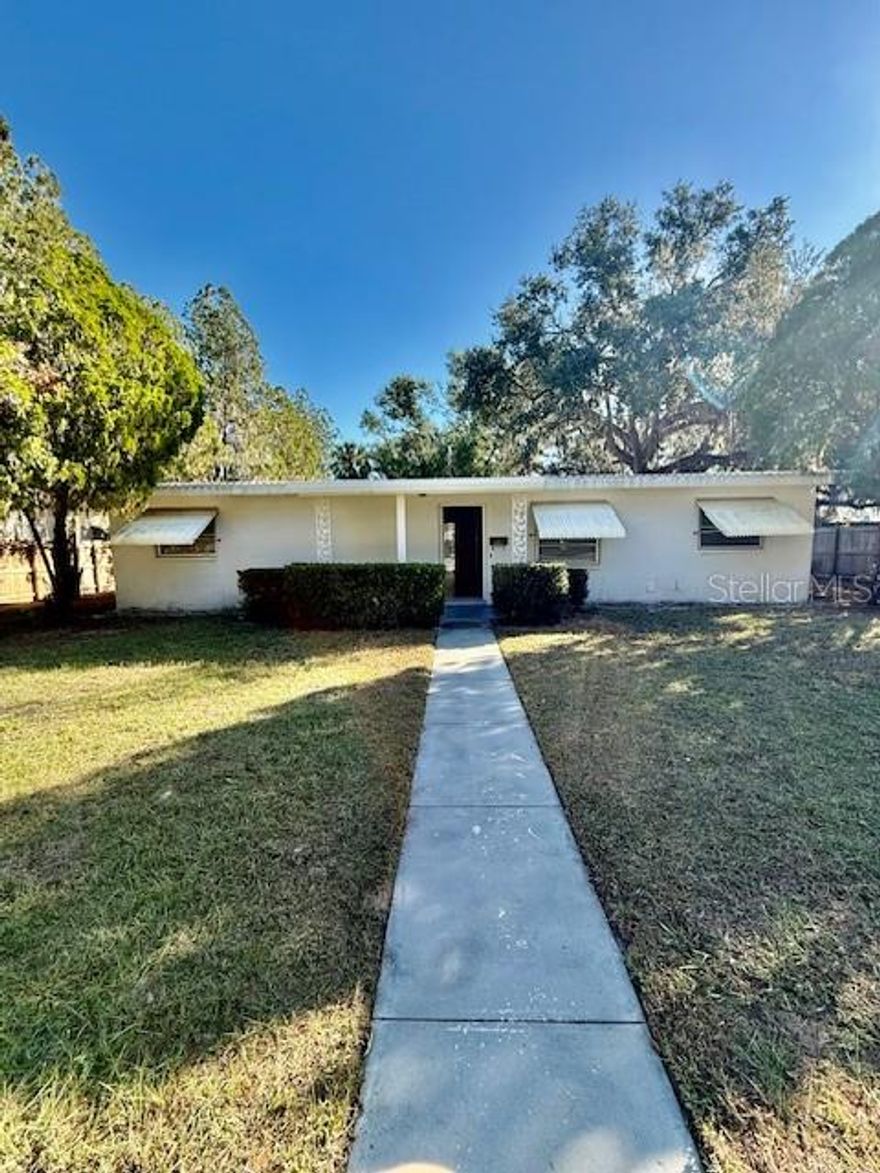 This property is situated on an oversized  lot with rear alley access to a massive 3-car garage. Recently remodeled 2 Bedroom 2 Bathroom 3-car garage home is great to run a small business. The home has enough parking for your boat or RV Parking and a detached shed makes this space ideal for a thriving business. Walk into a spacious living room area.  Light and bright kitchen features, Stainless Steel appliances, a glass backsplash, tons of kitchen cabinets.  Outside to the kitchen is a separate laundry room with storage. Hugh enclosed Florida patio makes a great space for entertaining or BBQs.  Fenced Backyard for privacy!Great Neighborhood, minutes away from the downtown area.