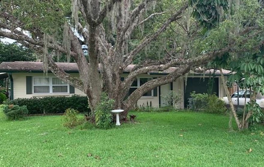 Live the good life in this stunning, fixer upper.  Nestled on a shady 80 x 125 lot with room for all of your hobbies! This home has so much potential and is just waiting for you to put in some work!  With 1250 sq ft of living area, large family room with fireplace and indoor laundry room.  One car garage plus a large concrete block workshop with roll up door, 8" poured reinforced concrete floor and 60-amp service.  There's also room for your boat or RV to be stored under cover.  With some sweat equity and TLC this will be the perfect starter, vacation or retirement home.  This Florida shores home is conveniently located to shopping and restaurants plus it’s just a short distance to the beach! 

All information deemed reliable but not guaranteed ;Water: City