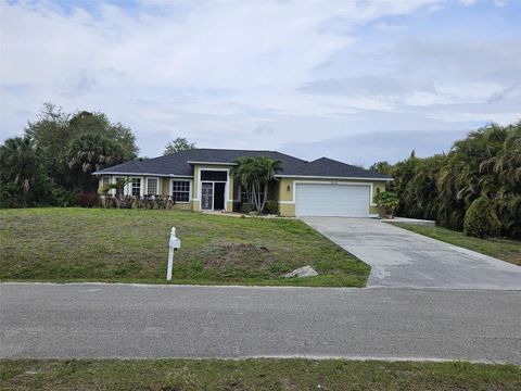 Photo of 713 Palmetto Ave, Lehigh Acres, FL 33972 (MLS # C7506839)