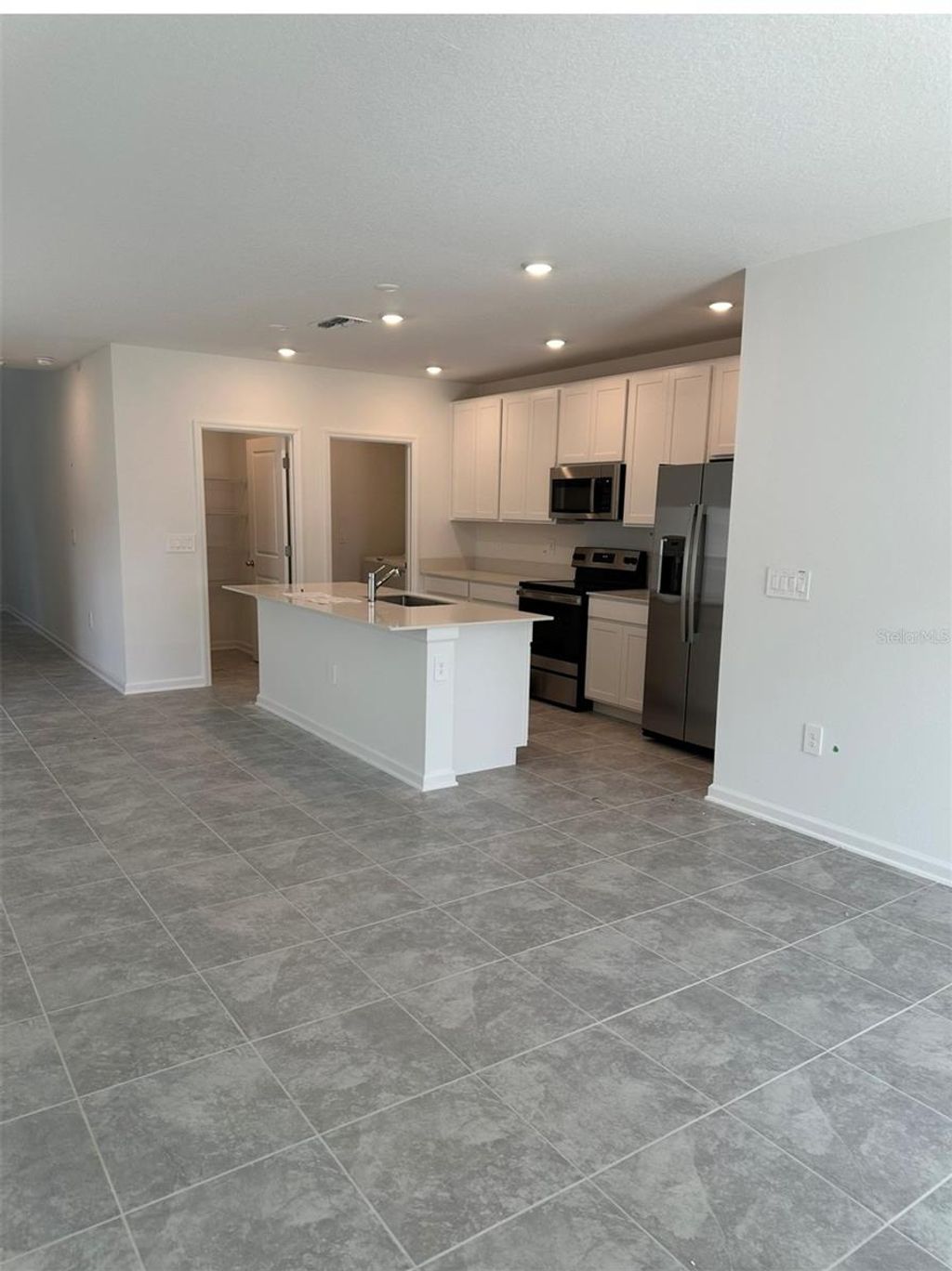 Photo of 2185 Aquifer Ln, Davenport, FL 33837 (MLS # O6346131)