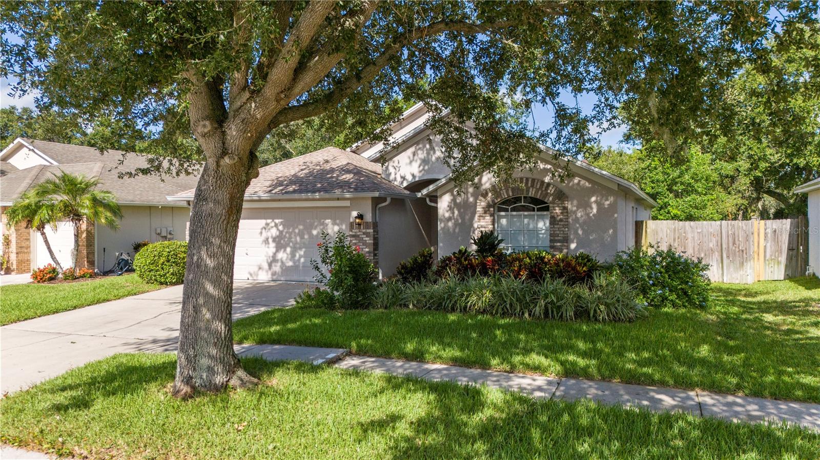 Beautiful Custom Touch home in highly desirable Lake St. Charles! This well maintained 1,718sf home is a perfect blend of comfort and design featuring three spacious bedrooms and two nicely appointed bathrooms. The heart of this home is the brick custom kitchen with Corien Counters and flat cooktop with built in wall oven. Ample counter space makes cooking in this kitchen a breeze! The open concept layout allows for seamless flow between the living and dining areas creating a welcoming atmosphere. Natural light floods the space highlighting the finishes and thoughtful details throughout. Each bedroom offers generous closet space. Enjoy your morning coffee on the screened lanai overlooking a conservation area. You will have peace of mind with a new roof (2022), AC and ductwork (2019), new sod (2025), and home is wired for a generator! Lake St. Charles offers many amenities: community pool, tennis courts, pickle ball courts, basketball courts, sand volleyball pit, two dog parks, playground and walking trail. Best access to the interstate and Selmon Expressway in all of Riverview!! Schedule a tour and start packing!!