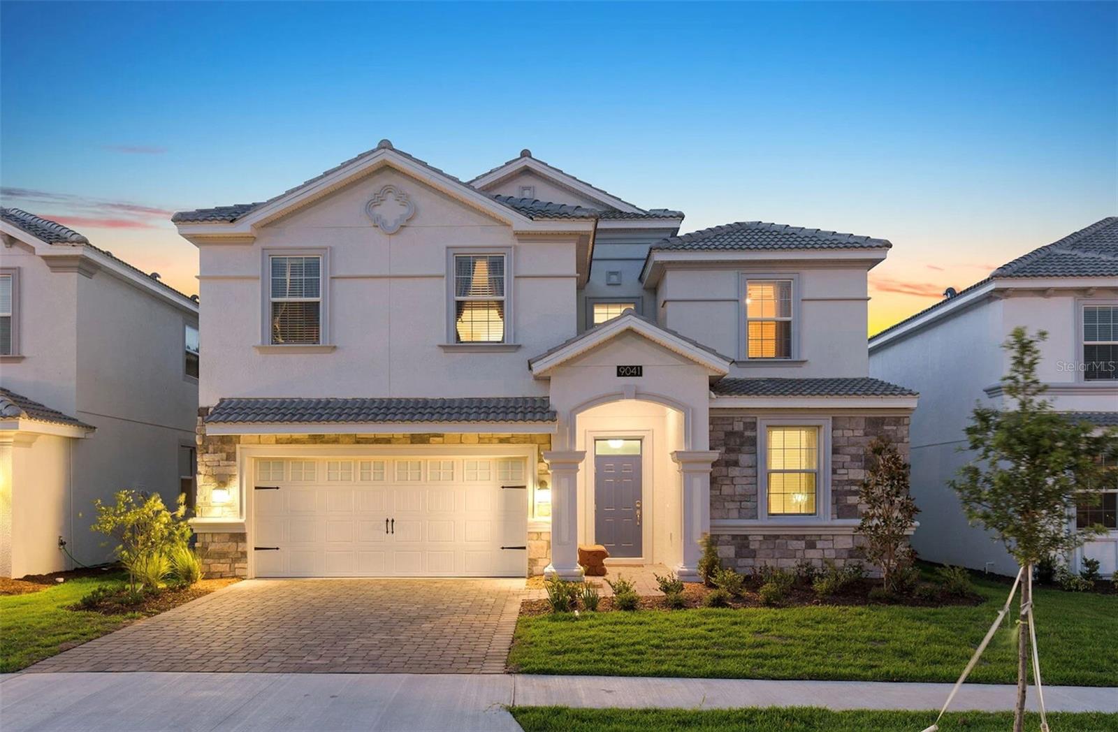 BEAUTIFUL FULLY FURNISHED home with 8 bedrooms, 5 full bathrooms, located in one of the most sought after and luxurious gated resorts, The
Retreat at Champions Gate. This is a turn-key home for homeowners who want to enjoy the Florida lifestyle and those who demand excellent
returns through short-term rentals! This house is close to the Walt Disney World® parks and all of the fun attractions of Orlando! This luxurious
house is filled with amenities. A home theatre is equipped with in-ceiling surround sound and leather seating custom-built on two tiers in
upstairs. There are 2 master bedrooms downstairs, and six bedrooms upstairs; plenty of room for you and your friends to stay. A fully stocked
beautiful cabinet modern kitchen has stainless steel appliances to make the stay stand out much more. Enjoy the screened-in backyard patio,
facing the Florida sunrise over the lake with a large pool, patio dining area, and pool loungers. Champions Gate Resort is a 24/7 guard-gated
community resort, surrounded by golf courses, and has a spectacular Resort style clubhouse that includes a 200,000 gallon pool, lazy river,
water park with splash-zone and cabanas, poolside tiki bar, water park, hot tub, bar and restaurant, game room, movie theater, tennis, volleyball
and basketball courts, fitness center and much more.