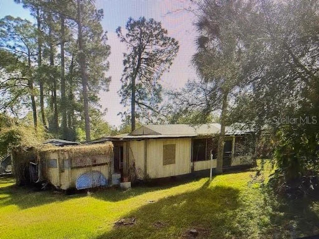 Photo of 28 Magnolia Road, Palm Coast, FL 32137 (MLS # G5102385)