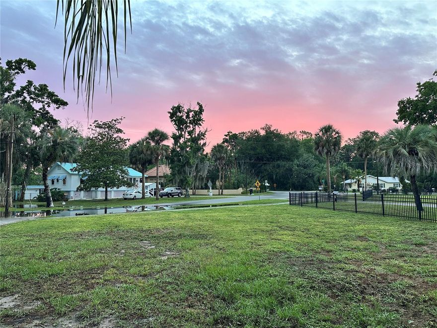 Welcome to your private waterfront oasis just five houses from the world-famous Three Sisters Springs, where manatees gather from all over Florida. During winter, hundreds of manatees can be seen gliding gracefully through the canals. This beautifully updated 2BR/2BA retreat offers a rare natural shoreline where manatees often swim right up to feed—sometimes with a mama and calf just steps away. Step into the water from your backyard and swim with the manatees or launch your kayaks, with a convenient outdoor shower to wash off afterward. Inside, coastal charm meets modern luxury with terrazzo floors, faux wood blinds and cool colors throughout. Step into an oversized living room that is perfect for entertaining. The kitchen and living room overlook an expansive great room with panoramic waterway views. This chefs kitchen features solid wood soft-close cabinetry with glass accents, slide-out shelving, and granite counters. There is a custom coffee bar, pantry and a 13-ft bar with pop-up outlets and elegant lighting—ideal for holidays and hosting friends and family. The expansive primary bedroom easily accommodates a king-size set and flows into a spa-like ensuite with an oversized Zen-like shower with frameless glass and two separately controlled showerheads. Complete with granite double vanities, lighted anti-fog mirrors, and a Bluetooth exhaust fan with music. The suite also includes two closets, one being an oversized walk-in. The bathroom features a door with interior blinds that opens directly to a beautiful oasis and waterway view. The spacious guest bedroom offers plenty of room, while the guest bathroom features custom cabinets, granite countertops, and a backlit anti-fog mirror. Unwind with a good book and bath bomb in the deep soaking tub. Updates include a 2019 roof, new stainless appliances, washer/dryer, two new water heaters, upgraded electrical, and new mini-split AC units with individual room controls. The garage fits two cars deep and two wide with an air-conditioned bonus area, plus a two-car carport adorned with massive decorative staghorn ferns. Ideal for seasonal or full-time vacation living, the home can be offered furnished and ready to enjoy. You can savor morning coffee on the back patio surrounded by herons, hawks, blue jays, eagles, and manatees or enjoy the breathtaking sunsets from your screened-in front patio and finish off Moonlighting in your hot tub. Walk to downtown for waterfront dining, live music, and boutique shopping—or take a short drive to beaches and boating. This home is a true waterfront getaway, offering the ultimate Crystal River lifestyle with manatees, wildlife, and endless water adventures.