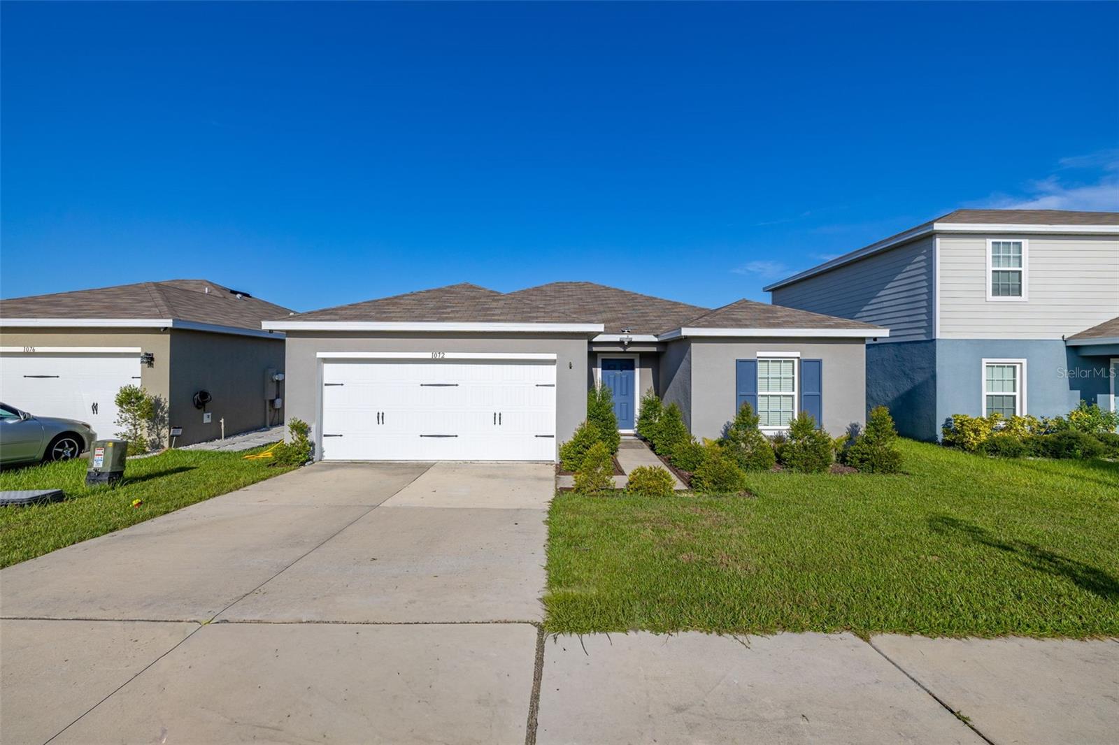 Welcome to this beautifully maintained 3 bedroom, 2 bathroom home in the desirable Orchid Terrace community of Haines City. This move-in-ready residence features stunning new flooring in the spacious living room and a thoughtfully designed split floor plan, perfect for both comfort and functionality. The master suite is a true retreat, offering a spacious layout, a walk-in closet, and an en-suite bathroom. The two additional bedrooms are located on the opposite side of the home, creating a private space for family or guests. Step outside to enjoy the extended lanai and a fully fenced backyard with no rear neighbors, offering the ultimate in privacy and outdoor living. The home is equipped with a solar-powered battery system, providing energy efficiency and peace of mind. Located in a well kept community with a sparkling community pool. With pride of ownership throughout, this property offers modern upgrades, eco-friendly living, and a convenient location close to schools, shopping, dining, and major highways.