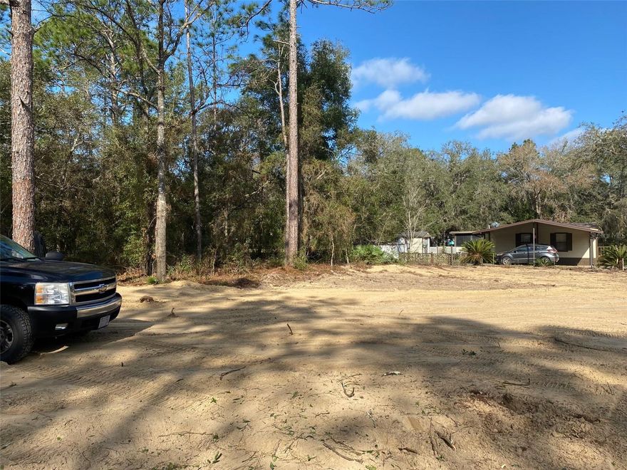 Build your dream home on this 1.14-acre partially cleared lot, perfectly situated between Ocala and Dunnellon. Enjoy the best of Florida’s natural beauty with nearby adventures—swim with manatees in Crystal River, float peacefully down the Rainbow River, or explore scenic state parks with nature trails. This prime location also offers easy day trips to both coasts for stunning beaches, attractions in Orlando, and sports and entertainment in the Tampa Bay area. Don’t miss the opportunity to make this your ideal Florida retreat!