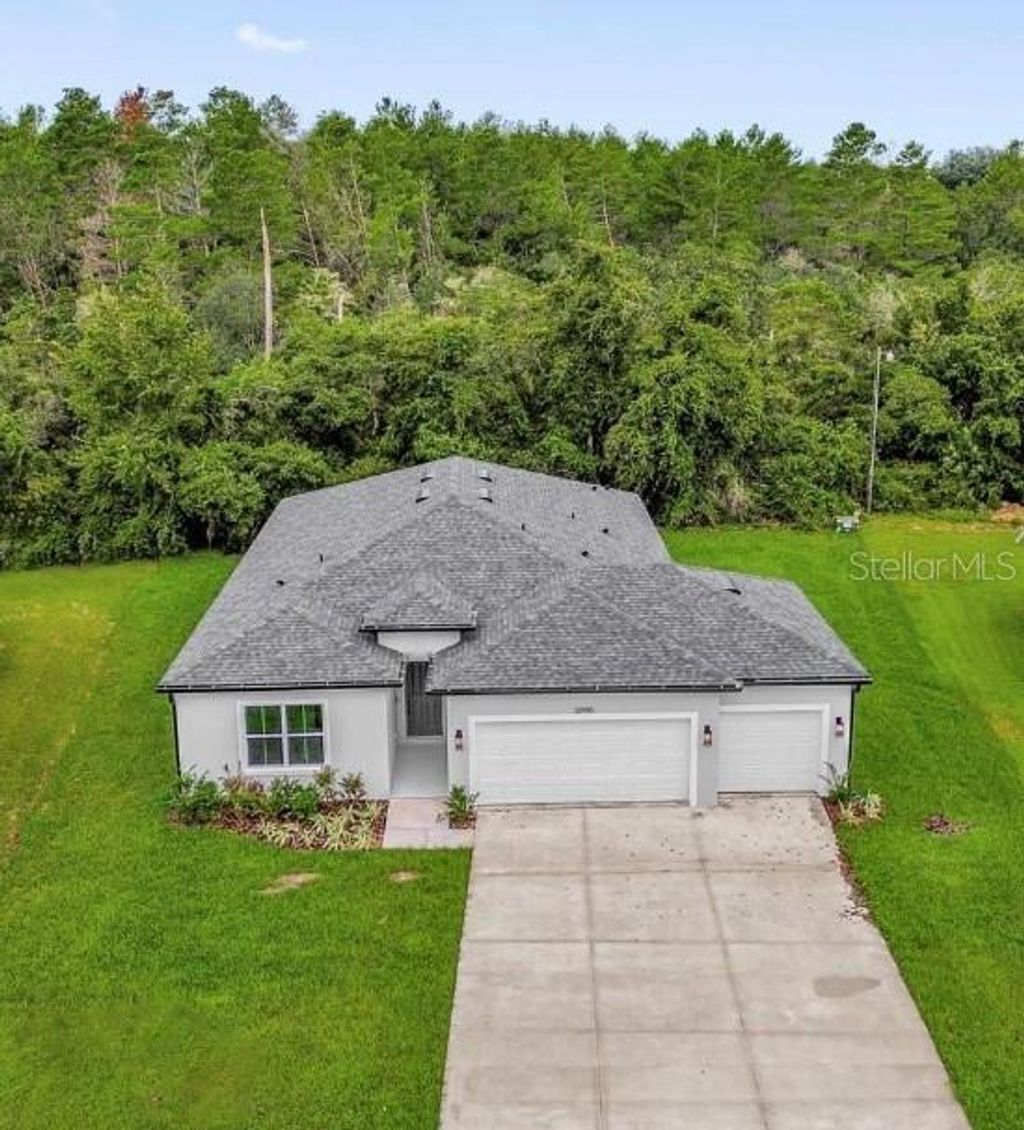 Photo of 13990 SW 34th Terrace Road, Ocala, FL 34473 (MLS # OM714310)