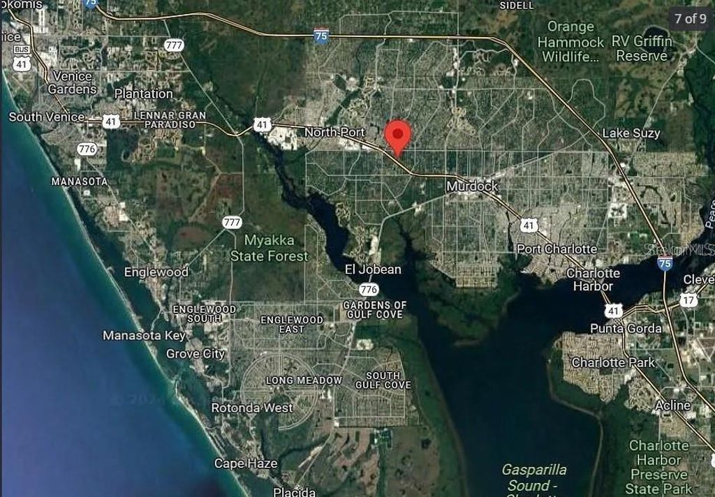 Photo of 123 Adalia Terrace, Port Charlotte, FL 33954 (MLS # O6352439)