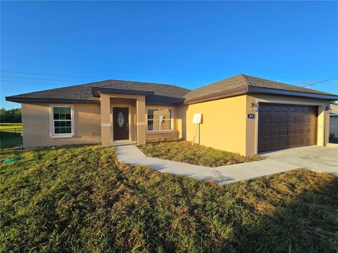 Photo of 315 Locust Pass, Ocala, FL 34472 (MLS # OM710333)