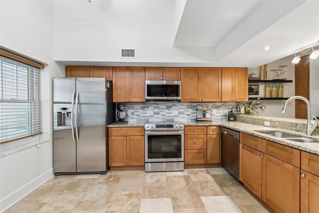 Photo of 2599 Dolly Bay Drive #302, Palm Harbor, FL 34684 (MLS # TB8502696)