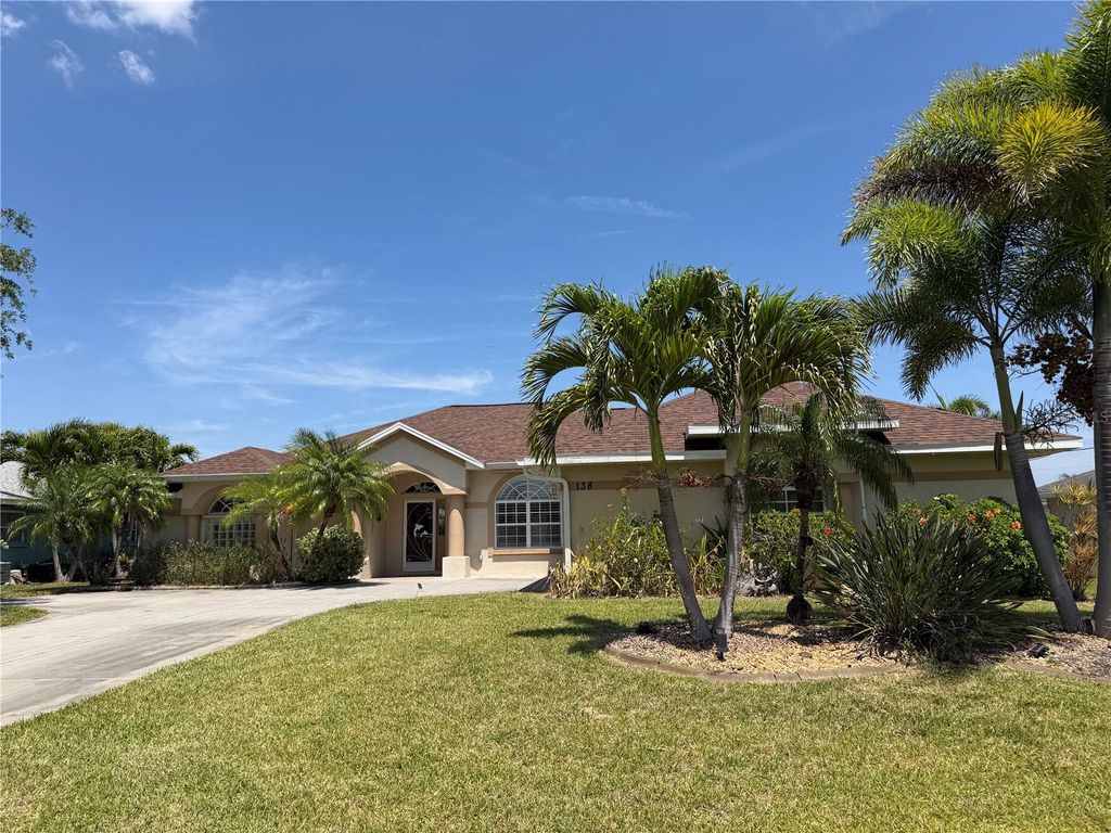 Photo of 138 Broadmoor Lane, Rotonda West, FL 33947 (MLS # D6147056)