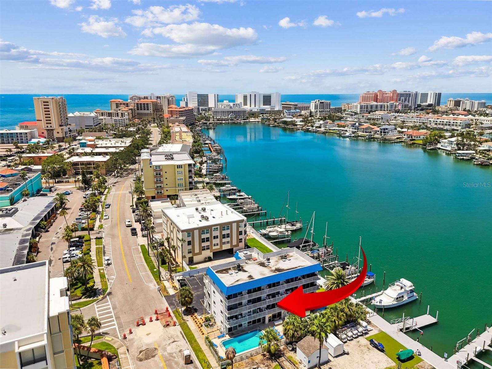 NO RENTAL RESTRICTIONS! INCOME OPPORTUNITY! NOT A CONDOTEL. Second floor furnished condo DID NOT FLOOD DURING HELENE! Rarely Available on Clearwater's South Beach, vacation, income, investment rental condo with NO minimums for guest stays, NO owner use maximums and NO preapprovals required for bookings. Heated pool and pets are welcome, with elevator to all floors. The building is directly on Intracoastal and there are assigned boat slips/lifts. If a slip is available, you can rent it from owner. The dock is accessible to all residents and rental guests for fishing, walking, picnic tables and grill provided. From your unit, it is only a few minutes walk to our famous white sand beaches, Sand Key Park just over the bridge, and dozens of restaurants, bars, retail shops, salons, liquor & mini grocery stores - even mini golf! One assigned parking space. A fantastic opportunity to capture rental income and block out the the days you want to enjoy it for yourself! Laundry on site too, including private laundry for owners only. Fully furnished, turn key. Rental history available.