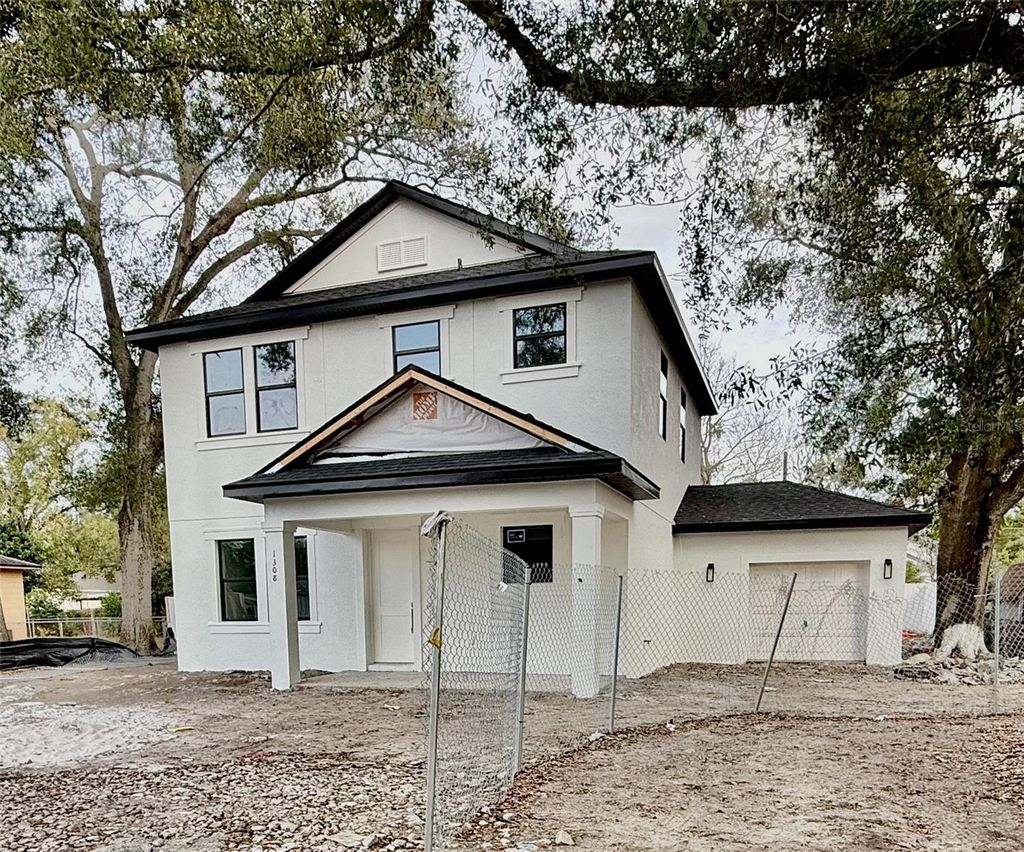 Photo of 1308 E Caracas Street, Tampa, FL 33603 (MLS # TB8464233)