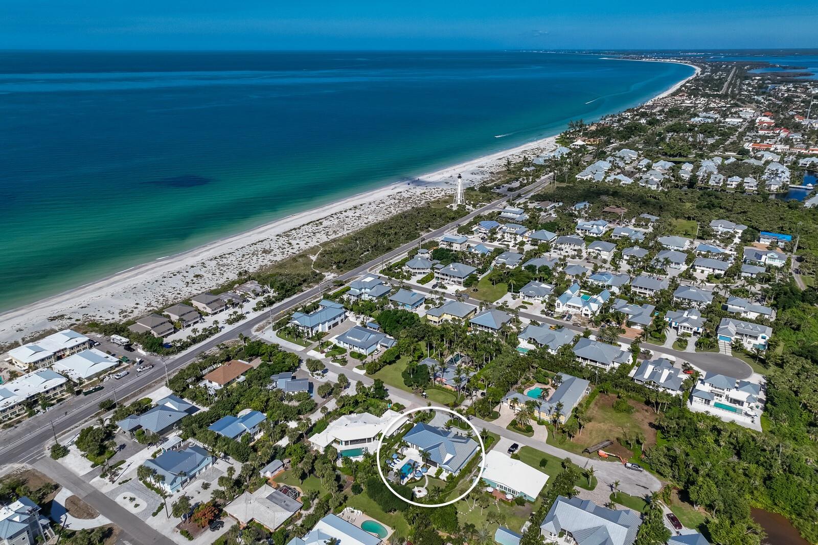 This reimagined 4 BR / 4.5 BA home located just south of the Village of Boca Grande is a masterpiece of coastal elegance. Completely redesigned, this concrete block home with new 2021 standing seam metal roof has been expanded to create every space a discerning Buyer would expect in a quintessential Island home. Upon entering the residence you are greeted by an open and light-filled living space adorned with soaring tongue and groove ceilings with beams and shiplap walls, custom designed linear A/C vents, and sprawling engineered wood floors. The Chef’s kitchen is a culinary delight featuring a 6-burner Wolf gas range, Sub-Zero Designer Series refrigerator/freezer, custom designed Zephyr range hood, and Wolf built-in microwave drawer. The contrasting navy blue oversized island with seating for 5 showcases gorgeous Taj Mahal Quartzite leather finished countertops, a Sub-Zero 2-drawer undercounter beverage refrigerator/freezer and separate ice maker. Upon entering the residence from the two-car garage bay there’s a generous mudroom with custom built-in seating, powder bathroom, oversized laundry room with sink and spacious countertops, and separate walk-in pantry with custom built-in wood shelves. Relax and unwind in the private master suite boasting a spa-inspired bathroom, spacious walk-in closet, private office with custom built-in desk and cabinetry, and sweeping views through French doors of the pristine outdoor landscape. The additional guest suites offer privacy for family and friends, each with an independent A/C zone/thermostat and bathroom. The custom designed bunk bed room features built-in drawers in “every step” maximizing space and storage with light and cell phone charging stations by every bed. The Progressive retractable screen offers year round enjoyment in the favorite room of the house…the outdoor lanai! This space is complimented with custom designed teak cabinetry, outdoor TV, beverage refrigerator, and additional ice maker. The entire home has been upgraded with a Control4 Smart Home system, new security/cameras, WiFi boosters, and Sonos surround sound for enjoyment both indoors and out. The “crown jewel” of this gorgeous home is the back yard! A true Florida oasis with a sparkling oversized pool with sun shelf surrounded by lush tropical landscaping and features a gas powered outdoor fire pit creating an ideal setting for entertaining or savoring tranquil moments. The house was taken down to the foundation with little left of the original structure…it is essentially a brand new home! New plumbing, new electrical, new walls, new impact glass Andersen windows….this home offers a haven of refined living amidst breathtaking tropical outdoor space. With beach access at the end of the street and close proximity to town, this is the island beach house you have been waiting for!