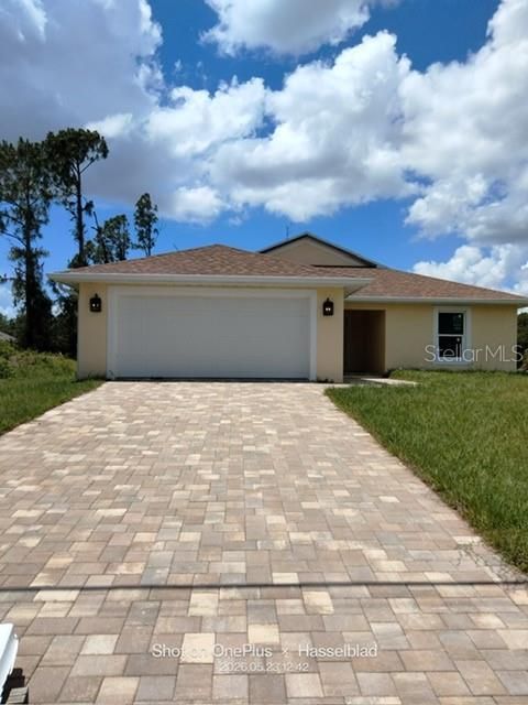 Photo of 5859 Farmington Avenue, North Port, FL 34288 (MLS # C7527010)