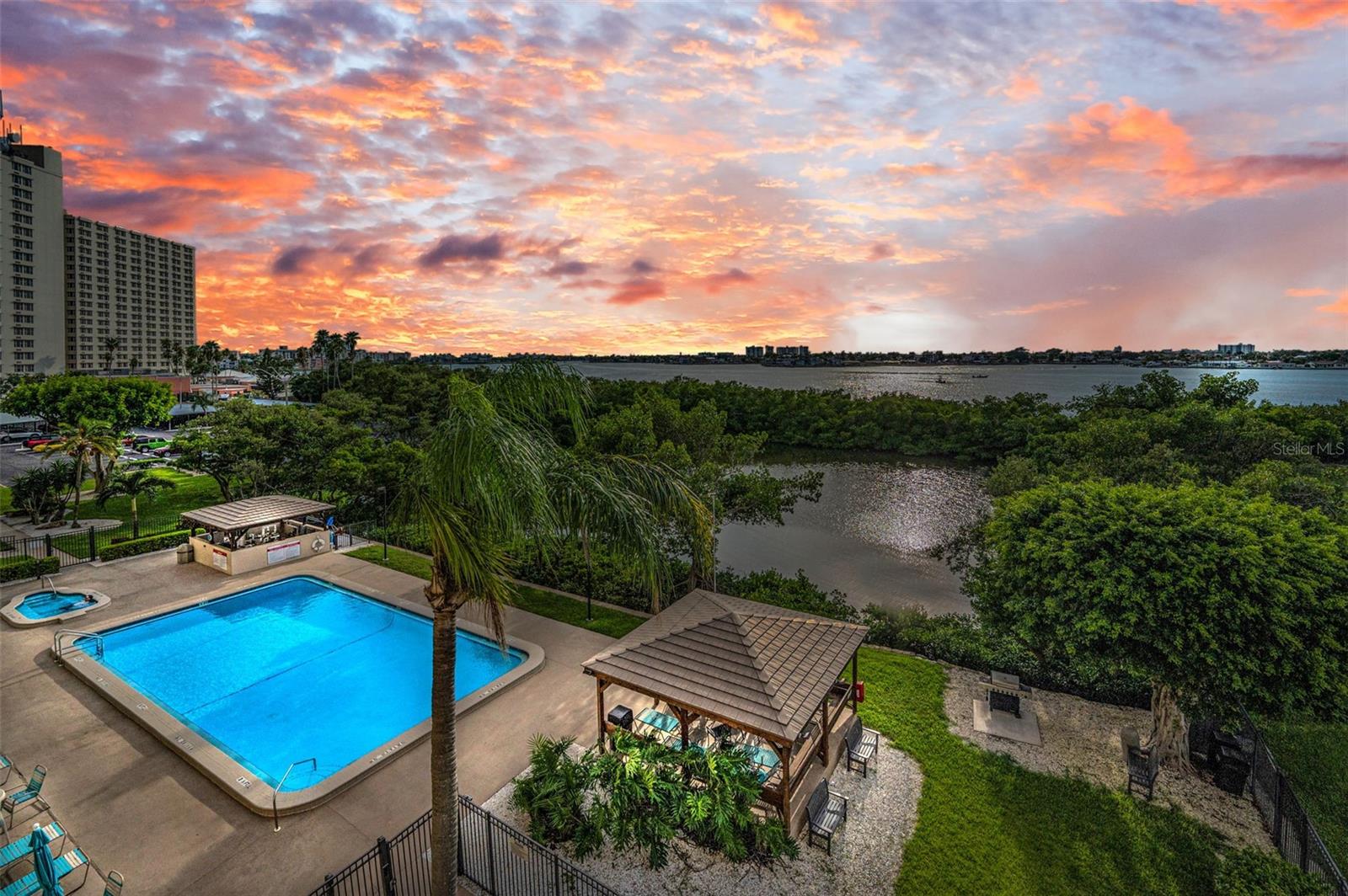 Incredible Waterviews ..... Endless Sunsets .... ! Open floor plan with recent updates, makes this a Home for You...! Located in the highly desirable community of Chateau Towers, a NO Age restriction Community in South Pasadena. NEW Kitchen just being completed with white shaker soft close cabinets, exotic quartzite counters, deep apron sink and white gloss Samsung Besoke Smart Appliances, newer lighting. Attractive and easy maintenance newer LVP flooring throughout the condo. The oversized Master Bedroom offers incredible Waterviews and Sunsets, His and Her closets, a spacious ensuite Master Bath will soon have a new shower surround with glass door, and quartz vanity top. Large open living and dining areas includes incredible views of the Gulf of Mexico and Boca Ciega Bay. The balcony patio is a perfect place to enjoy your morning coffee while watching the dolphins and manatees play and the boats go by. The charming guest 1/2 bath recently remodeled is perfect for your guests when they visit. Newly installed all-in-one washer dryer unit perfect for making your laundry chores easy. Extra large pantry off the kitchen is perfect for all of your extra supplies. So many updates including a hurricane shutters ..... just ask for the List..! Please note; pictures are showing the "old and the new" as the remodeling nears completion. The Sellers planned the remodeling many, many months ago (before Helene or Milton)and have been experiencing massive delays in permits and supplies. They are excited about almost being completed so they can move to their next journey. The popular community offers something for everyone; tennis courts, a steam room, sauna, gym, game room with billiards, ping-pong, air hockey, etc. For those who love the sun, there is a lovely heated pool and hot tub, grilling & pavilion area, with a serene view of the bay. Kayak/paddle board storage & launch area, bike storage, + space dedicated for storage. This well-maintained community has a clubhouse with an inviting lobby, library and space for your social/private gatherings. There is an assigned, covered parking spot and ample guest parking. Security controlled access to the building. Chateau Towers is a wonderful waterfront community with low HOA fees and NO age restrictions. Close to everything; Downtown St. Petersburg with its fantastic dining scene and newly renovated pier, Johns Pass and world famous Beaches; just a bicycle ride to St Pete Beach. The building did Not experience any effects from Helene or Milton. The community has passed the Milestone Inspection without issue, as well as the SIRS. No special assessments are anticipated. What a wonderful opportunity to own your own Florida Paradise....! Call for your personal tour or a Facetime RealTime tour