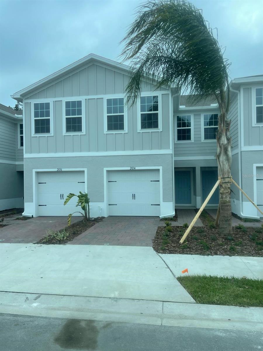 Gorgeous townhome built in 2023!!! This property is located just 4 miles from the beach. It has 3 bedrooms, 2 1/2 baths, 1 car garage / paved two cars driveway, open floorplan features kitchen with L shape bar and Island with plenty of seating and storage. It has a large covered lanai that backs to a privacy fence. It is also located just a few miles from I4, Embry Riddle and Daytona State college. Shopping, dining and parks all less than a mile away. Enjoy a large owner's bathroom with dual vanities and spacious walk-in closet with plenty of space.