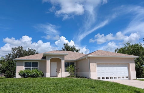 Photo of 1516 Westover Street, Port Charlotte, FL 33953 (MLS # A4705281)