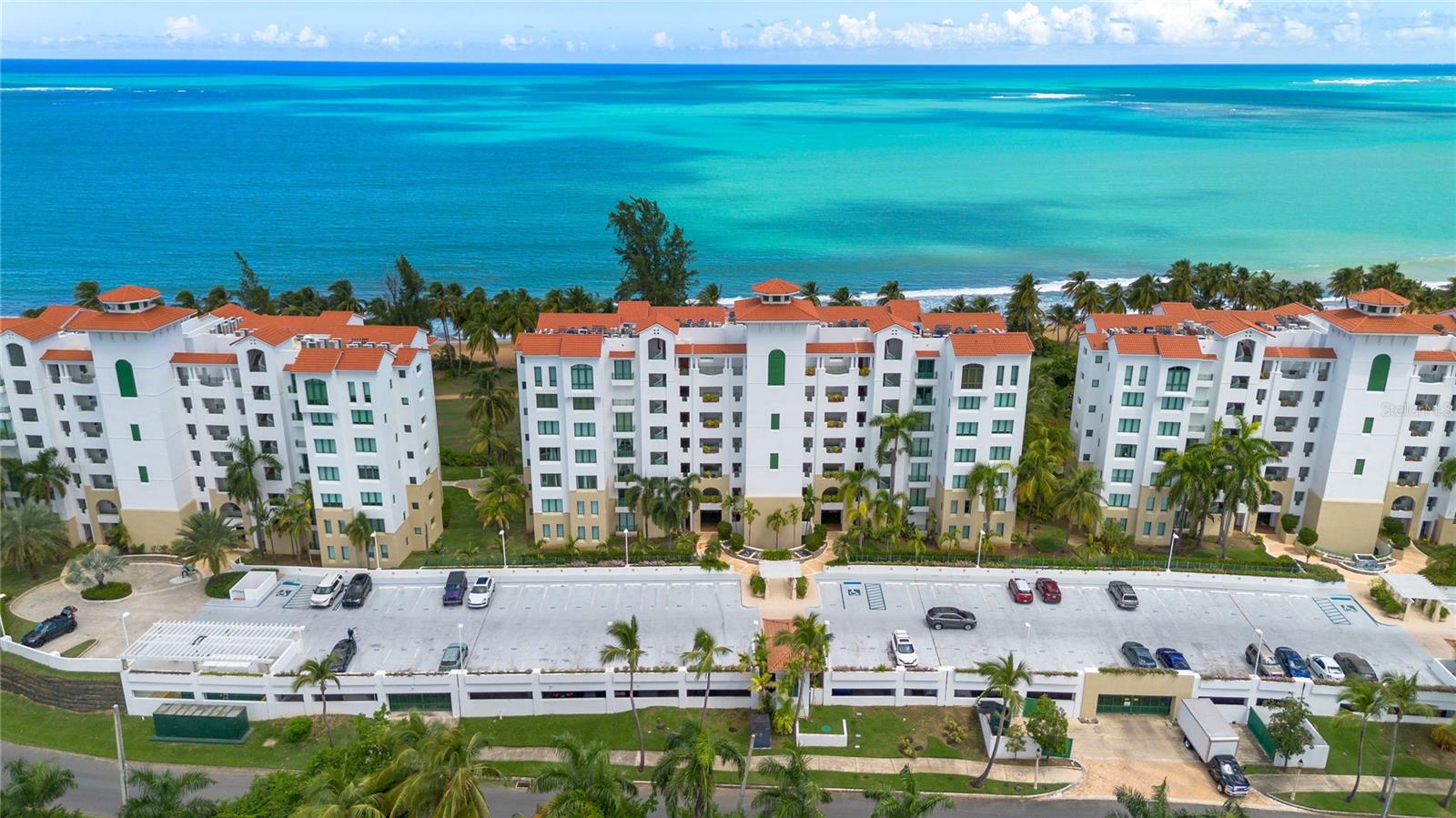 Welcome to your coastal sanctuary at Ocean Sixteen in beautiful RÃo Grande, Puerto Rico. This exceptional 2 bedroom, 2.5 bathroom beachfront residence offers the ultimate in luxury living with stunning ocean views and direct beach access.
As you enter, you're welcomed by an open-concept layout filled with natural light, highlighting elegant finishes and high-end details throughout. The spacious living and dining areas flow seamlessly onto a private balcony, where you can enjoy morning coffee or evening cocktails with the soothing sound of the waves.
The gourmet kitchen perfect for entertaining. Both bedrooms are designed for comfort, featuring en-suite bathrooms, ample closet space, and breathtaking views of the sparkling turquoise waters. A convenient half-bath is available for guests, ensuring privacy in the main suites.
Ocean Sixteen offers premium amenities, including a resort-style pool, fitness center, and 24-hour security, creating a peaceful, luxurious lifestyle in one of Puerto Rico’s most desirable locations. Enjoy daily strolls on the beach, and live the vacation life year-round in this extraordinary residence.