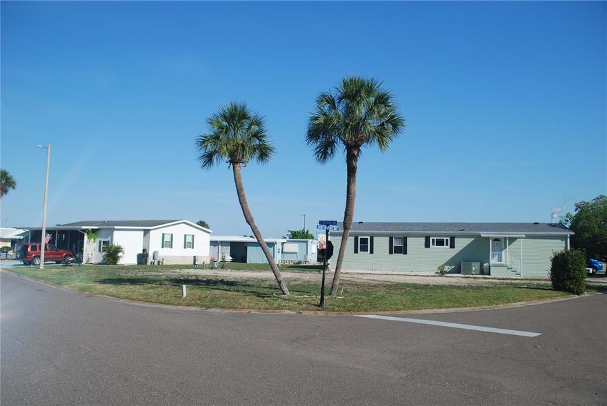 CORNER LOT in a desirable location.  Waterfront living is a life-style that offers views of the water, and canal access to Tampa Bay, out-door activities and a connection to nature. This prime location in the community is worth considering. Seller has removed the home and is ready to build on. Great location with canal access to Tampa Bay. Resort Style Living. No HOA, CDD or LOT RENT. Low monthly maintenance fee. Electric and water on site from previous home. If you're an outdoor enthusiast, you'll appreciate our kayak and boat launch facilities. For those who enjoy friendly competition, we have bocce ball, shuffleboard courts and horseshoes. The heated community pool is heated year-round. Inside our clubhouse, you'll discover a craft room and large game room, with pool tables, card table, indoor bar shuffleboard and darts, providing opportunities for creativity and socializing. Our community has many activities throughout the year. From themed dinners to dances, there's always something exciting happening to suit your preferences and keep you engaged year-round. Our prime location, conveniently situated between Tampa and Sarasota/Bradenton, ensures that you'll have easy access to an abundance of nearby activities. Beaches and thrilling amusement parks are just a day trip away. We invite you to pay us a visit and discover for yourself why so many call Caribbean Isles home.