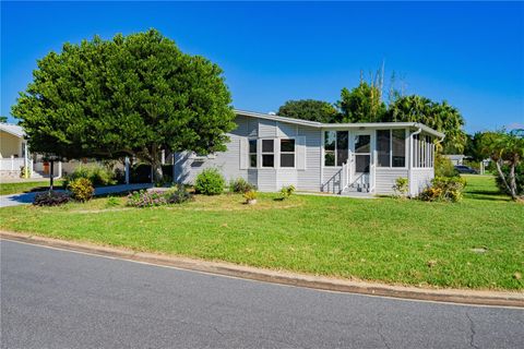 Photo of 701 Helmsman Lane, Edgewater, FL 32141 (MLS # V4945108)