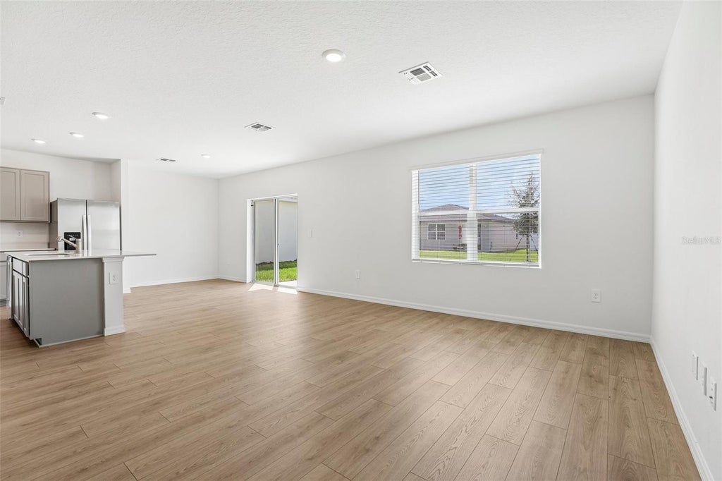 Photo of 6059 Navona Way, Winter Haven, FL 33884 (MLS # O6446013)