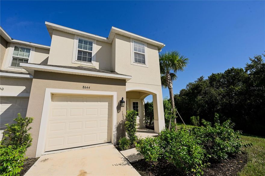Discover serene Florida living at 8644 Lunar Skye St, Sarasota, FL 34241—a stylish end-unit townhome offering privacy, comfort, and scenic pond views in the desirable Skye Ranch community. This three-bedroom, two-and-a-half-bath home features a modern open-concept layout with a bright and welcoming main level that flows seamlessly into the kitchen, where a thick stone countertop provides both functionality and a touch of luxury—perfect for entertaining family and friends. Upstairs, you'll find upgraded flooring throughout the second story, including the spacious owner’s suite with an en-suite bath and walk-in closet, as well as two additional bedrooms and a conveniently located laundry area. Storage is made simple with under-stair space, multiple closets, and a pantry just off the kitchen. Enjoy the peaceful surroundings from your private patio overlooking the pond, with the added benefit of being next to a nature area for tranquil walks and outdoor enjoyment. Community amenities include access to two beautiful pools.