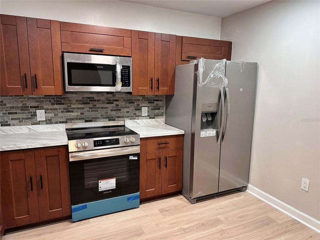 Photo of 5924 Sagunto Street, Orlando, FL 32807 (MLS # O6373229)