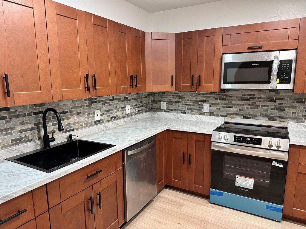 Photo of 5924 Sagunto Street, Orlando, FL 32807 (MLS # O6373229)