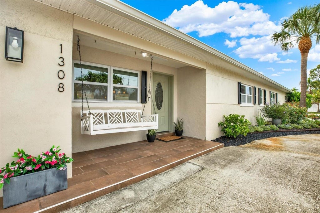 Photo of 1308 Marion Drive S, St Petersburg, FL 33707 (MLS # TB8516236)