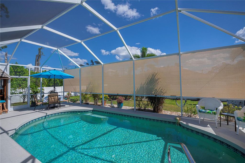 Photo of 2142 S Chamberlain Blvd, North Port, FL 34286 (MLS # C7515434)