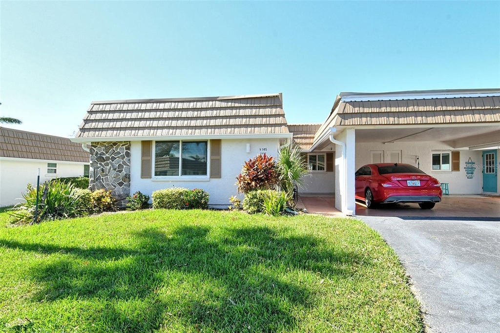Photo of 2607 Riverbluff Parkway #V145, Sarasota, FL 34231 (MLS # A4626176)