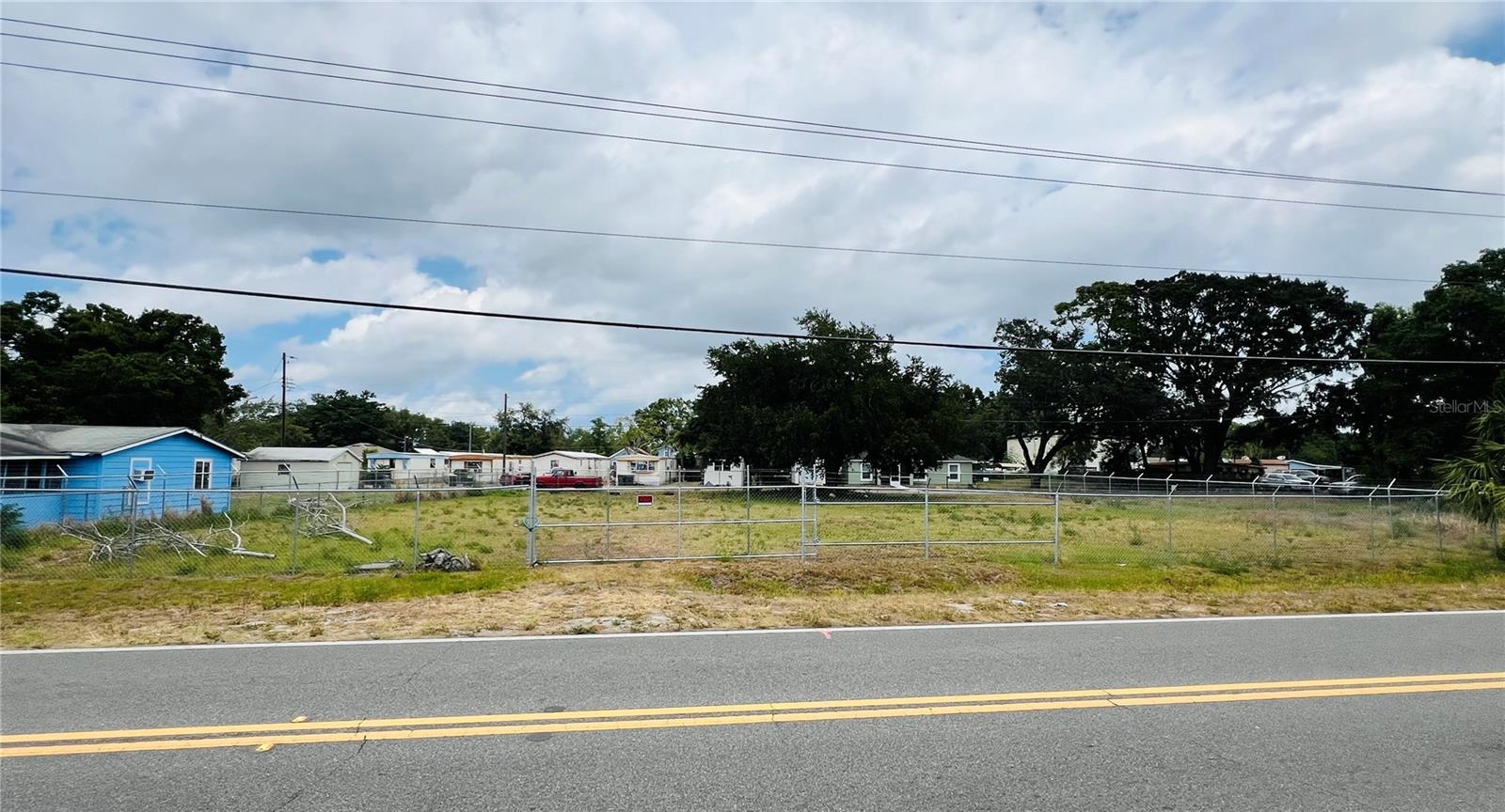 Commercial Lot in Auburndale – Great Location Near Downtown - Positioned just minutes from downtown Auburndale and directly across from the REAL Academy, this .33-acre commercial lot offers excellent visibility in a residential area. Zoned for commercial use, it’s a fantastic opportunity for a small strip mall or neighborhood-focused business. With steady local traffic and convenient access to major roads, this property is well-suited for developers or investors looking to serve the surrounding community. The location combines the benefits of proximity to downtown with a strong neighborhood presence. From the city of Auburndale: Commercial Highway Zoning allows for: Motel/hotel, Restaurants, including drive throughs, Retail shops, Commercial for recreation, Veterinary, Sales and display lots for cars, RVS, boats - Package and retail sale of alcohol, financial institutions, General retail sales, Mini-warehouse (self-storage) if the site is over 22,000 sq feet and 100 foot wide property line frontage, & Medical marijuana. Prohibited uses in Commercial Highway: Dwellings, Storage warehouses, Truck terminals, All other uses not listed in permitted (No metal buildings)