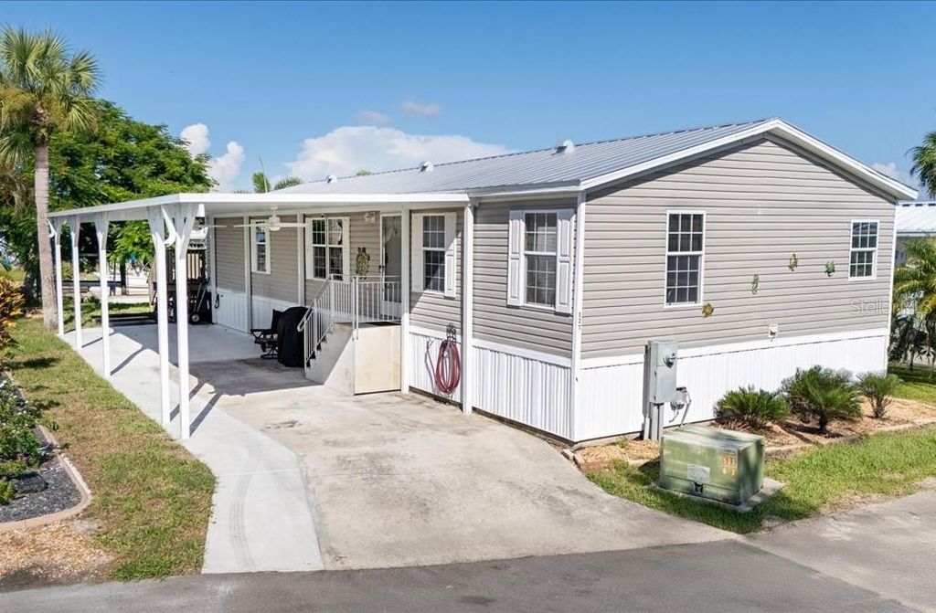 Photo of 3127 Bayside Parkway, Punta Gorda, FL 33982 (MLS # C7515955)