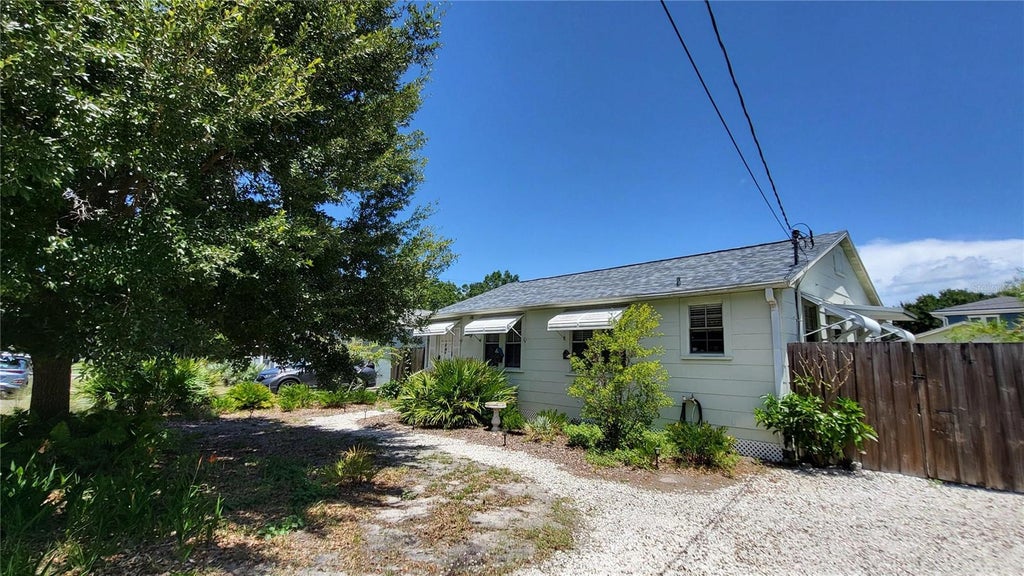 Photo of 919 W Woodlawn Avenue, Tampa, FL 33603 (MLS # O6424675)