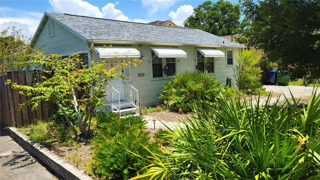 Photo of 919 W Woodlawn Avenue, Tampa, FL 33603 (MLS # O6424675)