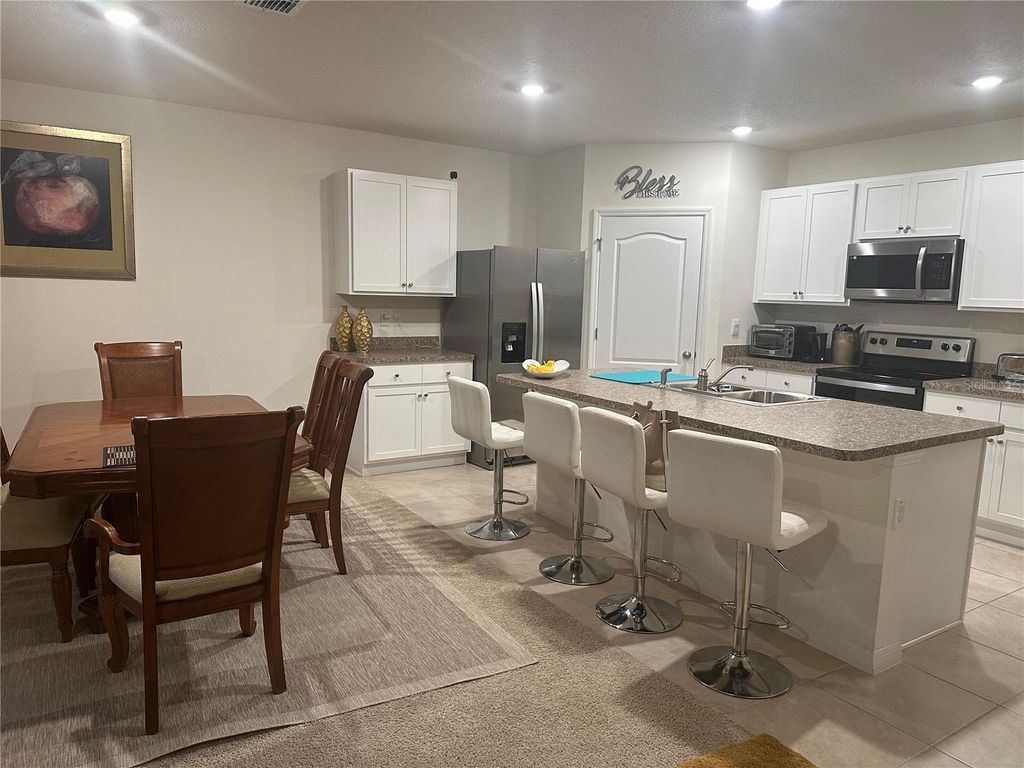 Photo of 303 Alencon Way, Kissimmee, FL 34759 (MLS # S5144839)