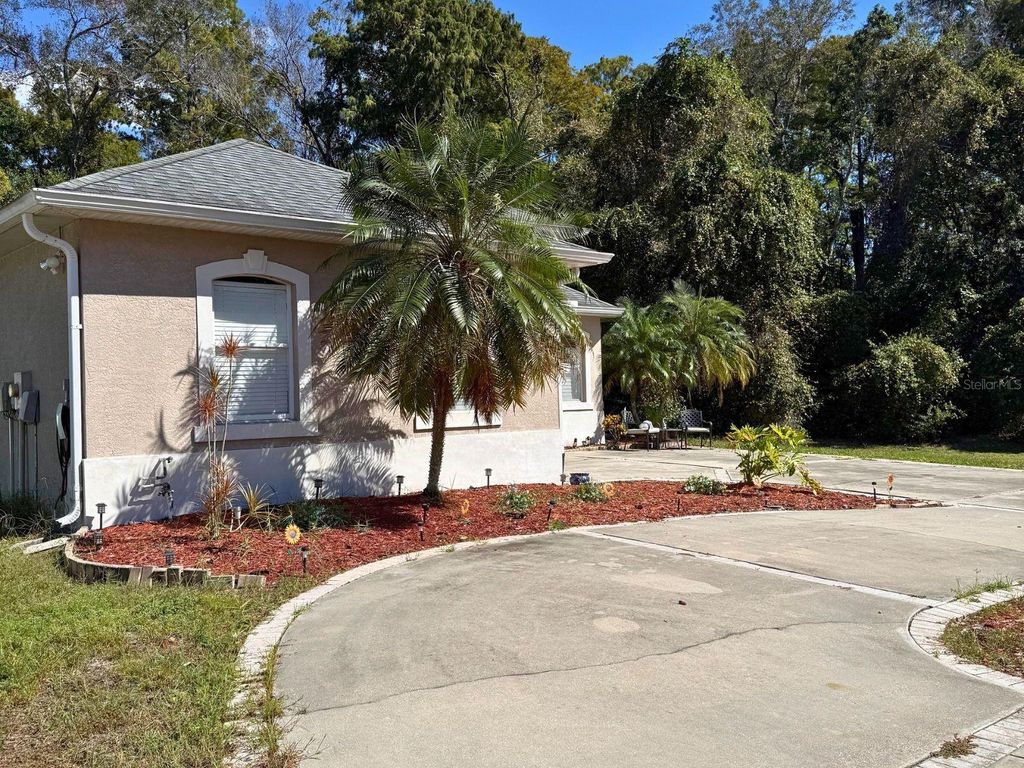 Photo of 12140 Hunters Lake Drive, New Port Richey, FL 34654 (MLS # W7880185)