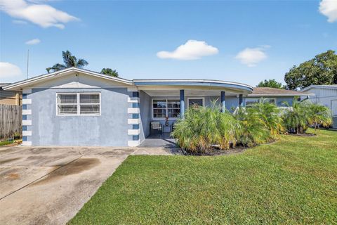Photo of 3837 Darlington Road, Holiday, FL 34691 (MLS # TB8439214) Photo of 3837 Darlington Road, Holiday, FL 34691 (MLS # TB8439214)