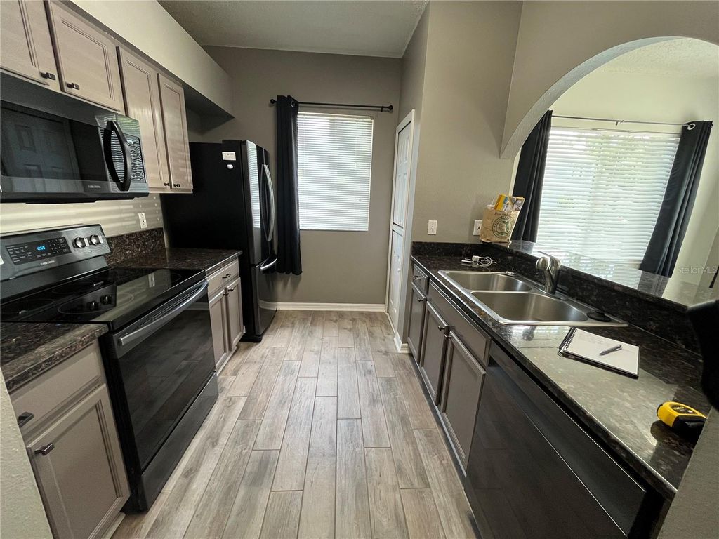 Photo of 18124 Paradise Point Drive, Tampa, FL 33647 (MLS # TB8429874)