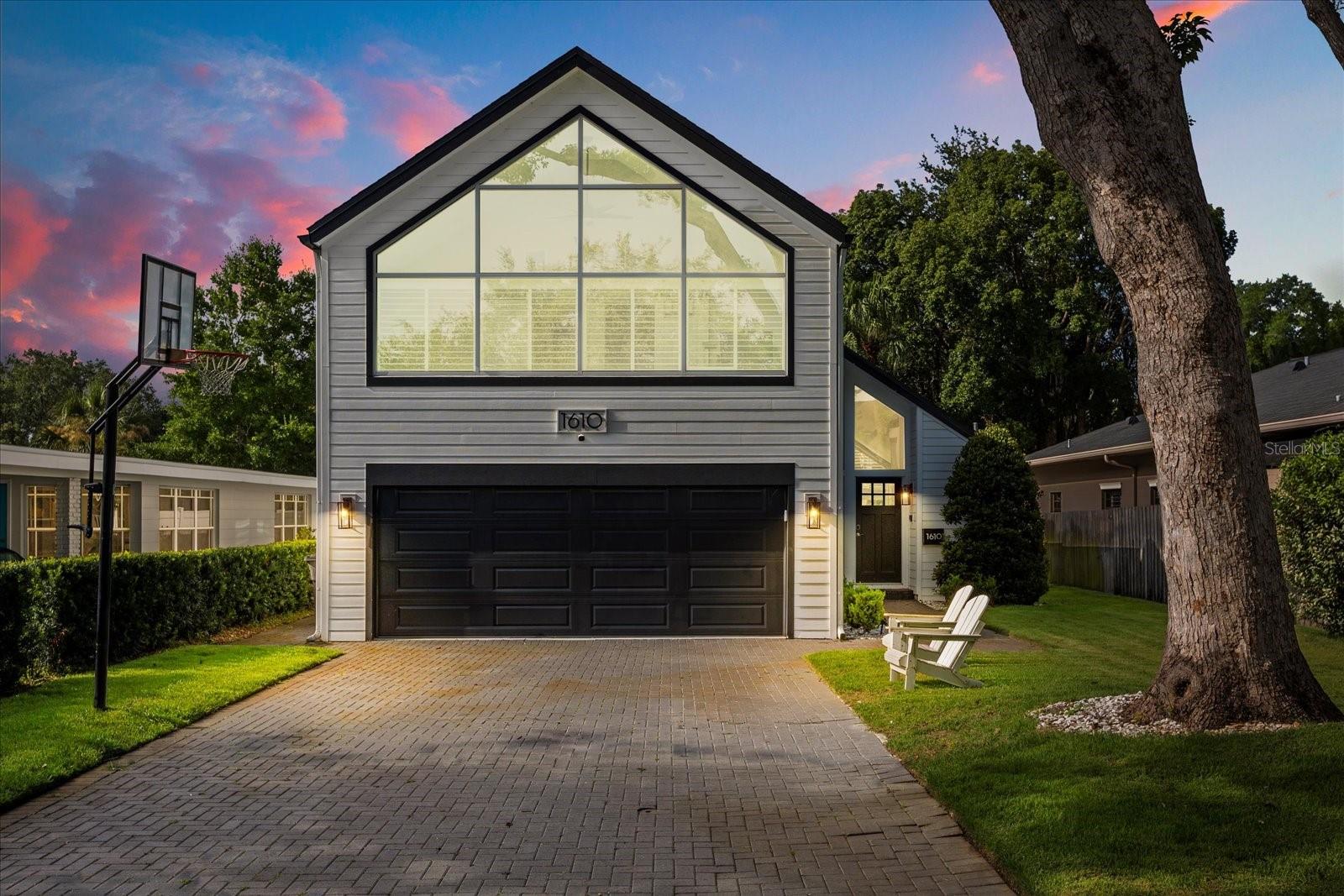Under contract-accepting backup offers. Nestled in the desirable Tree Streets of Winter Park, this stunning Mid-Century Modern residence offers timeless style, thoughtful updates, and effortless indoor-outdoor living. With over 2,100 square feet of beautifully designed space, this 3-bedroom, 2.5-bath home delivers modern functionality with elegant character—just minutes from the heart of Park Avenue.
Inside, you'll find an open floor plan with engineered hardwood flooring, high ceilings, crown molding, and abundant natural light. The kitchen is a chef’s dream, featuring a convection oven, cooktop, range hood, and brand-new appliances—ideal for both daily living and entertaining. A wet bar with wine fridge, cozy sunroom, and custom closets in all three bedrooms elevate the home’s comfort and convenience. The primary suite is located upstairs, offering privacy and retreat.
The backyard is a true Florida oasis, complete with a newly resurfaced saltwater pool, expansive artificial turf, a custom putting green, and a deck with a retractable awning—all within a fully fenced yard designed for privacy and year-round enjoyment.
Additional upgrades include a new roof (2020), updated A/C system (2021), garage storage solutions, and lush front landscaping. With no HOA, a 2-car garage, and extended driveway parking for 4+ vehicles, this home offers both style and flexibility in one of Winter Park’s most coveted neighborhoods.
A rare opportunity to own a turnkey home in a prime location—schedule your private showing today.