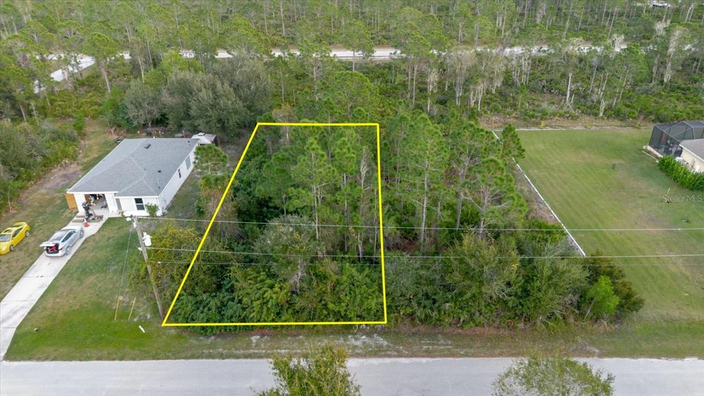 Photo of 12174 Poindexter Avenue, Punta Gorda, FL 33955 (MLS # TB8459436)
